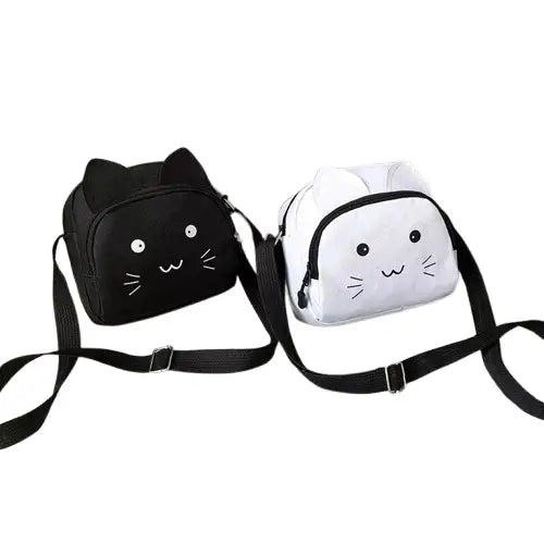 Sacs à bandoulière élégants en forme de chat sur un canapé Transparent Background