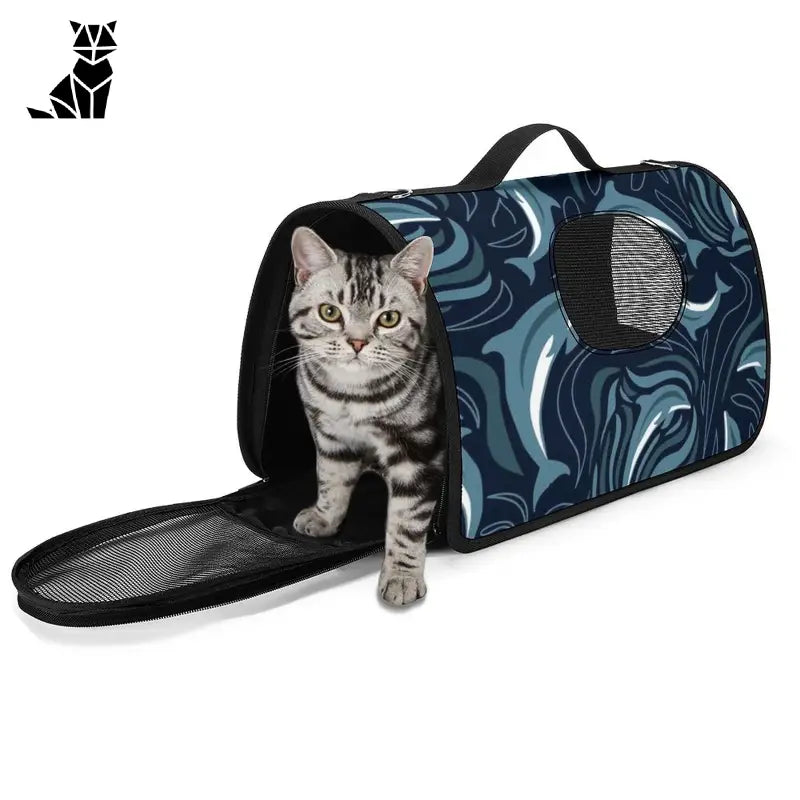 Chat dans une cage de transport bleue et noire, sac de voyage personnalisé avec fermeture éclair pour un voyage ergonomique